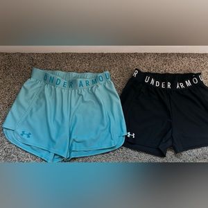 Two pair women’s XS UA shorts. Great condition perfect for running!